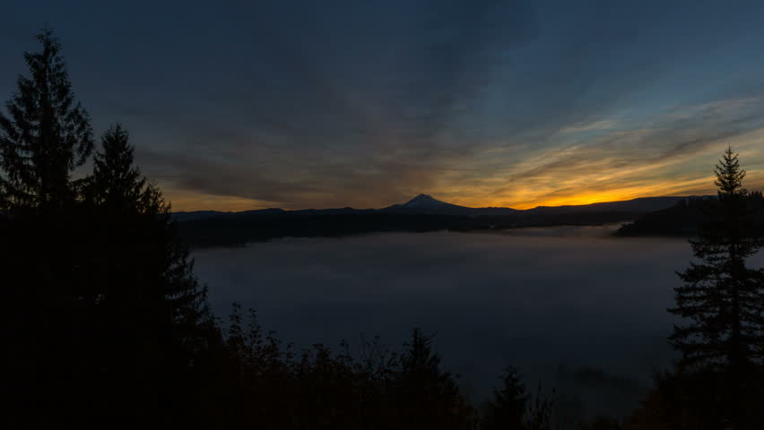 Time Lapse Movie of Sunrise with Blanket of Rolling Fog and Snow Covered Mt. Hood in Sandy Oregon Over Sandy River from Jonsrud Viewpoint Early Morning 1080p
