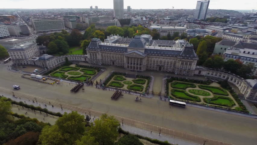Royal Palace of Brussels marching cavalry aerial city view fly