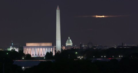 Washington DC Skyline Timelapse at Night With Super Moon, Lincoln Memorial, Washington Monument and US Capitol Building. There is plenty of time before the moon appears to use without the supermoon.