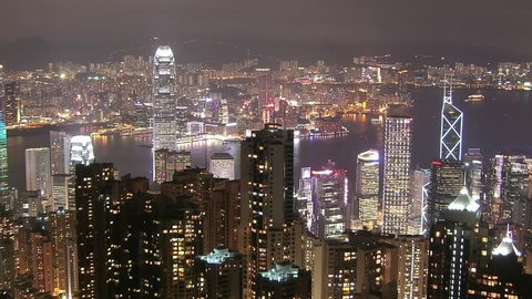 Time Lapse Movie Hong Kong skyline from famous Peak View at night. 29,97 fps, NTSC, Zoom out