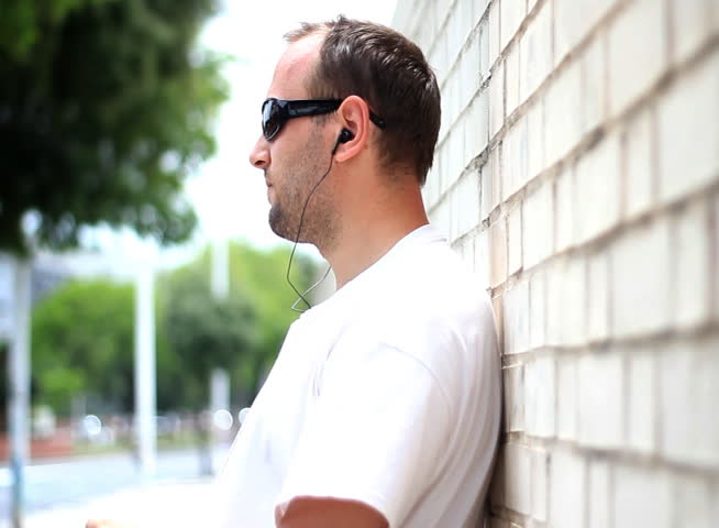 Man in sunglasses drinking water - NTSC