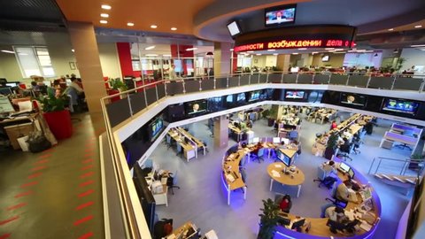 MOSCOW, RUSSIA - MAR 5, 2013: Top view of staff working in office of RIA Novosti russian news agency