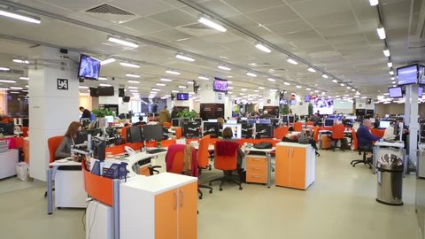 MOSCOW, RUSSIA - MAR 5, 2013: People work in big office of RIA Novosti russian news agency