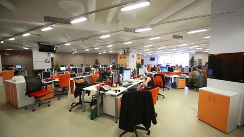 MOSCOW, RUSSIA - MAR 5, 2013: People work at computers in office of RIA Novosti russian news agency