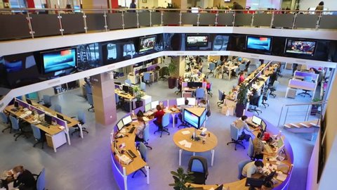 MOSCOW, RUSSIA - MAR 5, 2013: Top view of office with people of news agency RIA Novosti