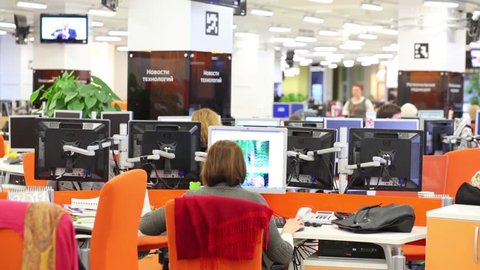 MOSCOW, RUSSIA - MAR 5, 2013: Employees work in modern office of RIA Novosti russian news agency