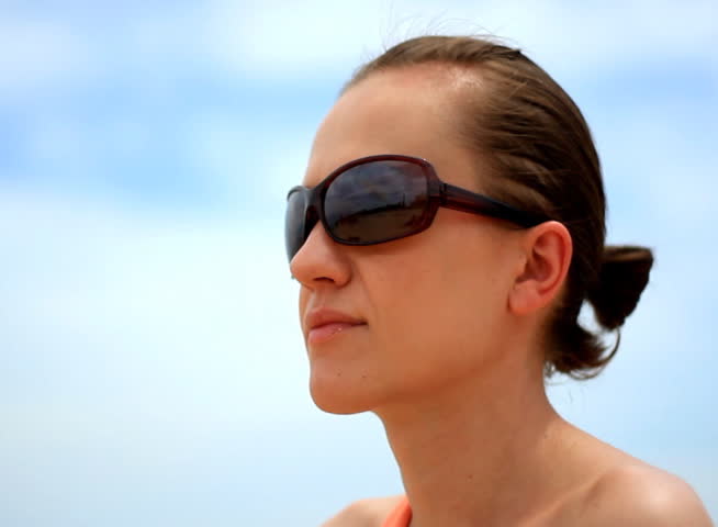 Attractive woman in sunglasses - NTSC