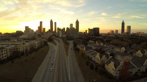 Atlanta aerial flying upwards with cityscape sunset view. Stock Video