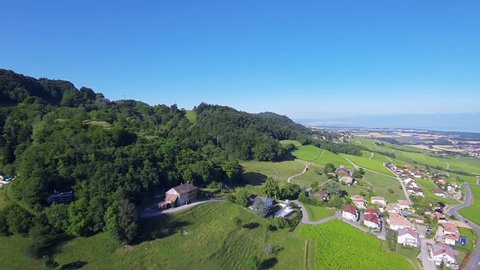 Aerial shot of Lake Geneva country side - Switzerland
Swiss panorama on a bright sunny afternoon. Beautiful village near Geneva