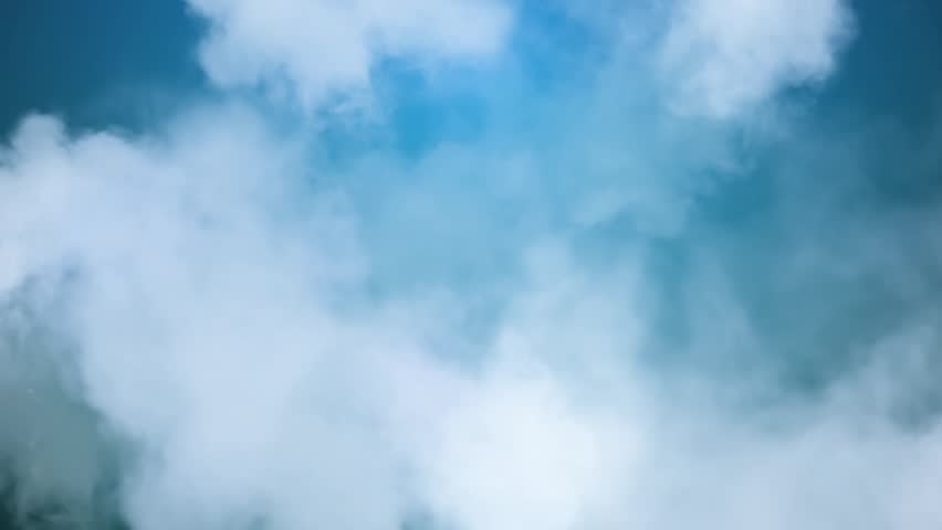 Clouds over Blue Sky Loop High definition animated background loop of white