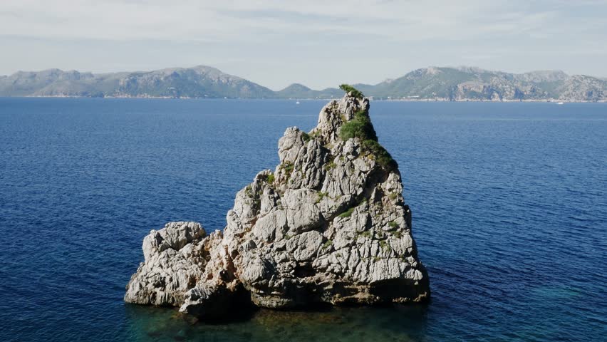 epic stone reef rock in ocean shoreline landscape