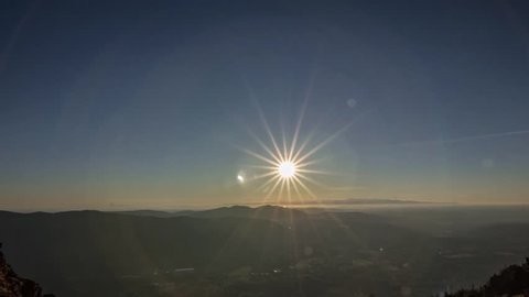 The sun sets over the Seattle Metropolitan area as seen from Mount Si. 