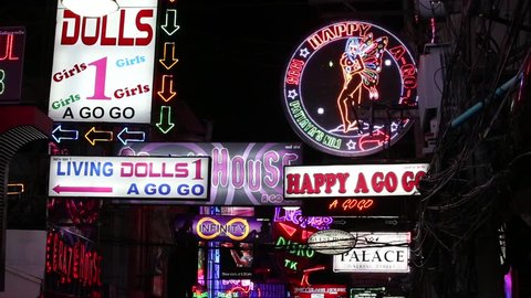 PATTAYA, THAILAND - NOVEMBER 15, 2014: Neon Signs nightlife clubs in Walking Street.  Walking Street is red-light district with many restaurants, go-go bars and brothels
