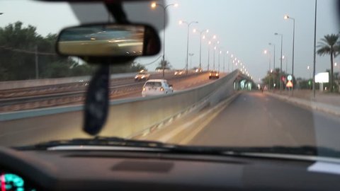Driving Along a Well Lit Overpass and Traffic Merging in Basra, Iraq, October 2014