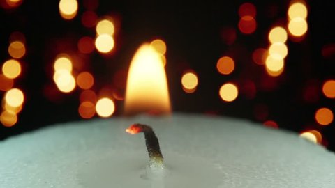 burning candle and christmas lights bokeh loopable
 Stock Video