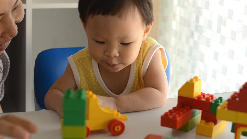 baby playing blocks