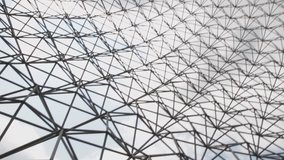 Pan under Geodesic dome. Panning camera under geodesic dome. Designed by Richard Buckminster Fuller, the "Biosphere"? was built for Expo 67 in Montreal, Quebec, Canada.   - Powered by Shutterstock - Get 15% off with code: PIKWIZARD15