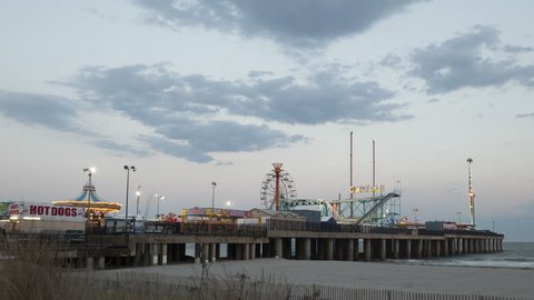 ATLANTIC CITY, USA - APR 27, 2014: 4K Time lapse zoom out Amusement Park at Steel Pier Atlantic City, NJ