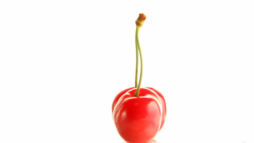 Cherry rotates on a white background