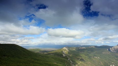 Movement of the clouds on the mountain bay Laspi. Crimea, Russia (TimeLapse) FULL HD
