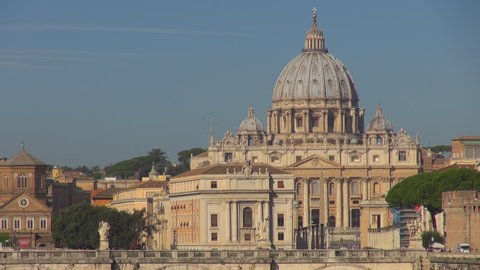 Timelapse of Basilica San Pietro in Vatican and traffic car on Umberto Bridge in Rome by sunny day