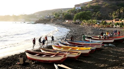 Cape Verde - March 2013: Fishing boats on the beach in the small town of Cidade Velha, Santiago which make up one of the ten Cape Verde Islands