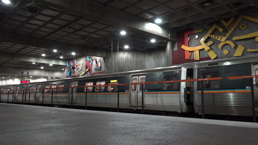 ATLANTA, GEORGIA/USA - OCTOBER 11, 2014: Marta train departs Midtown station. The Metropolitan Atlanta Rapid Transit Authority is the principal rapid-transit system in the Atlanta metropolitan area.