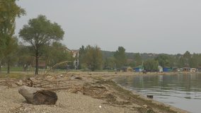 Brza Palanka  sand beach after floods panning 4K 2160p UHD footage - Village in Eastern Serbia Brza Palanka Danube river scenery at the morning 4K 3840X2160 UHD video