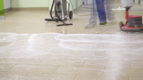 Electric machine washes floor