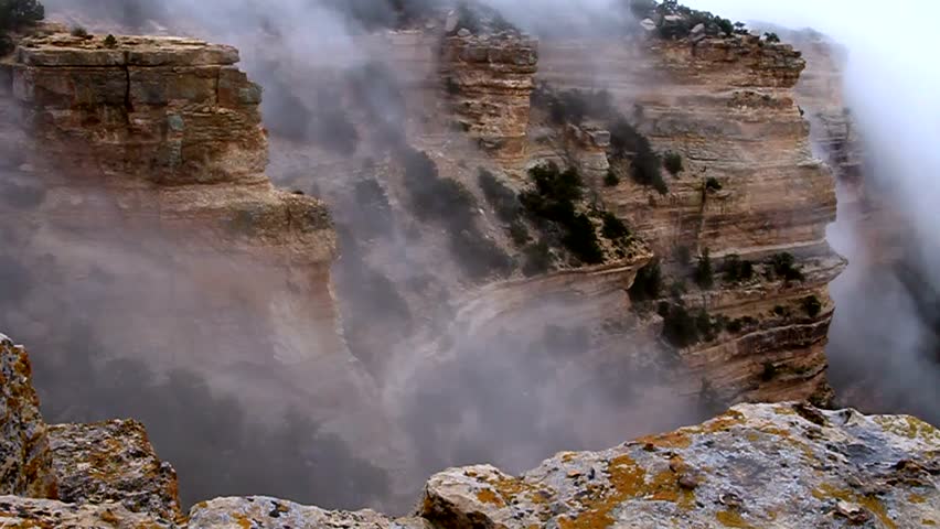 Fog blowing up and out of the Grand Canyon.