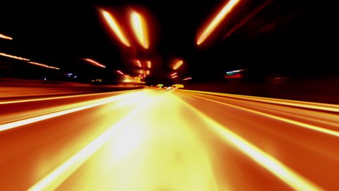4K Loopable clip of a pov (point of view) night driving hyperlapse timelapse of night traffic shot from outside the windshield of a car in a highway in Greece.