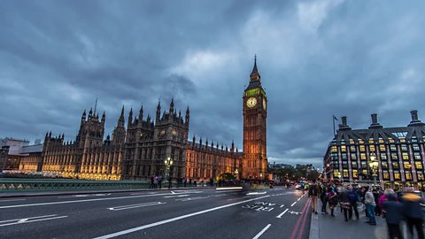 London, England, October 2014, 4k, Ultra HD time-lapse of tourists and commuters crossing westminster bridge in London