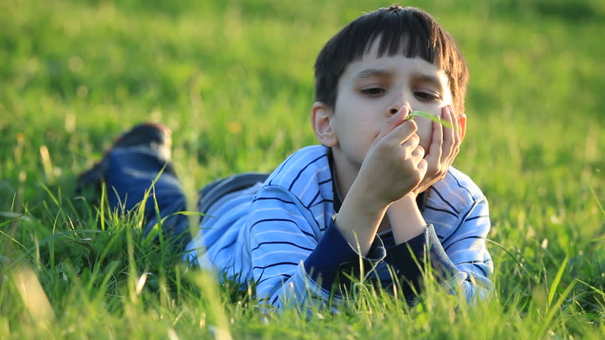Boy Lying in the Grass