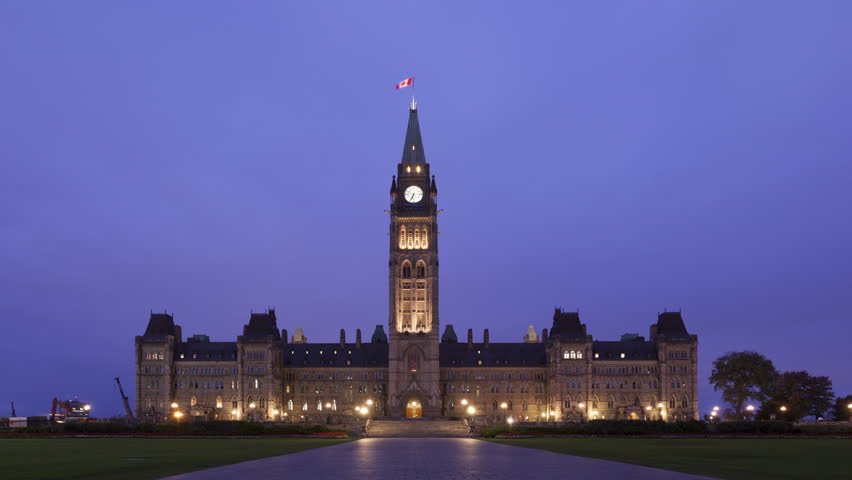 4K Time lapse Parliament of Canada at sunrise with twilight and clouds, Ottawa