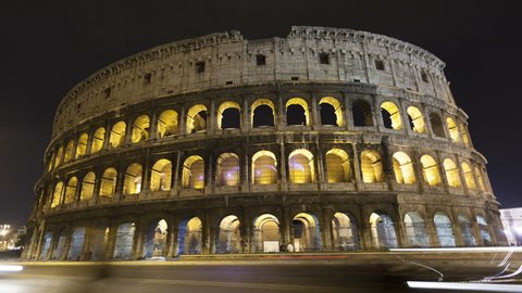 4K Time lapse of traffic in front of the majestic colosseum Amphitheater, Rome, Italy.