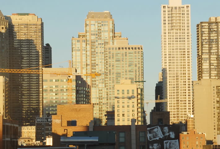 Sunset on city buildings time lapse