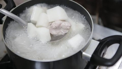 Boiling Japanese radish soup with pork ribs in a pot