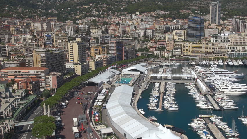 Aerial view of famous Monaco cityscape, La Condamine port and Monte Carlo downtown by day