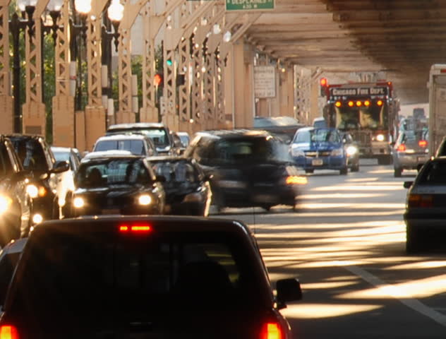 Urban intersection under railroad tracks time lapse