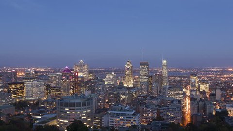 MONTREAL, CANADA - OCT 2, 2014: 4K Time lapse Montreal twilight after sunset viewed from Mont Royal with city skyline