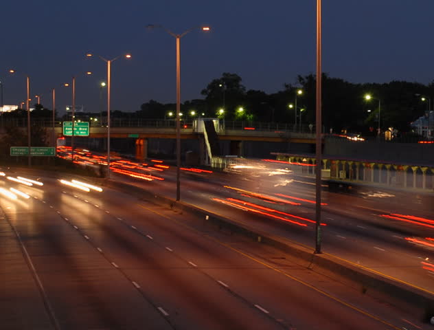 Speeding cars at night rush hour motion blur