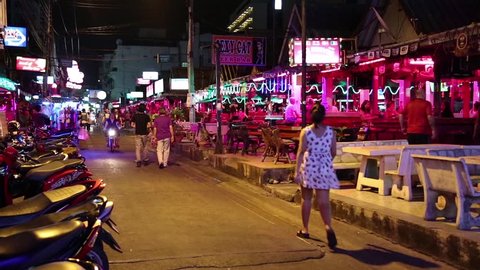 THAILAND, PATTAYA, MARCH 31, 2014: People at red-light district in Pattaya, Thailand