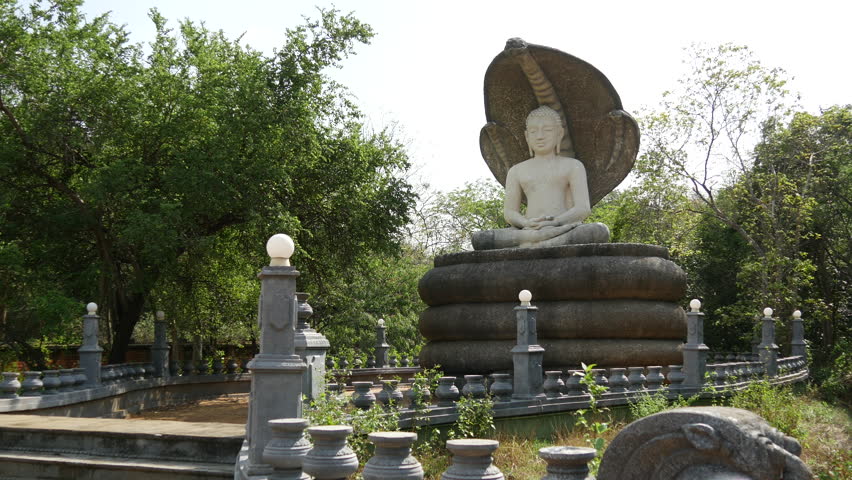 Buddha statue close to Sigiraya, lion rock and pidurangala in Sri Lanka