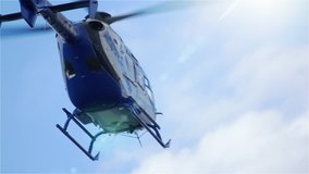 Medical Helicopter Ambulance leaving the scene to go to hospital slow motion stock video clip