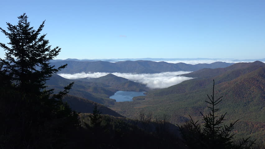 View from overlook of mountains and lake in the fall from Blue Ridge Parkway, NC