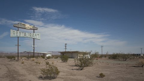 4K Time lapse of abandoned vintage restaurant and sign on historic Route 66, California, USA