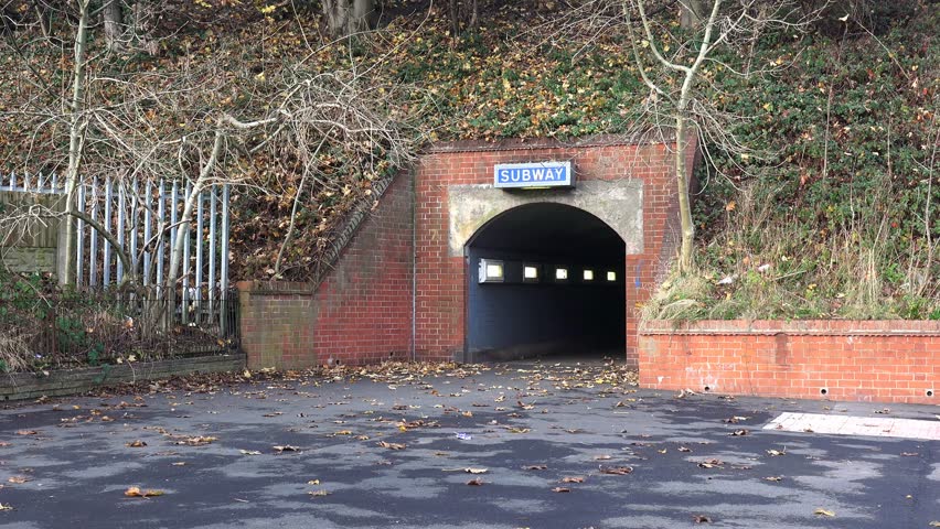Urban subway entrance and footpath backdrop - Rugely, Staffordshire, England: November 2014