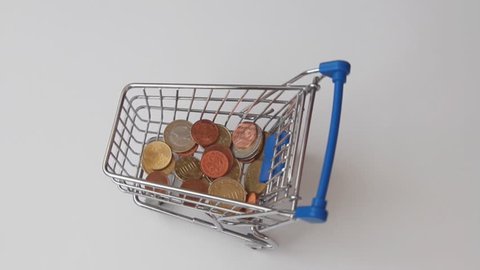 Money falls out of shopping cart