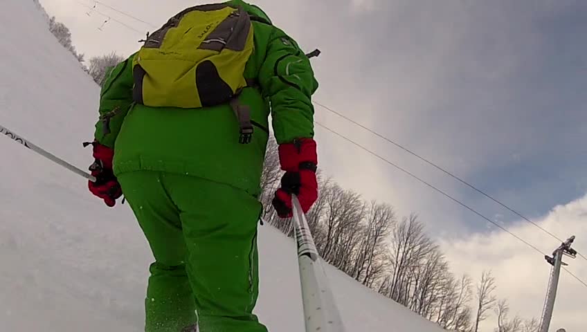 Ski sport man downhill at winter with slow motion