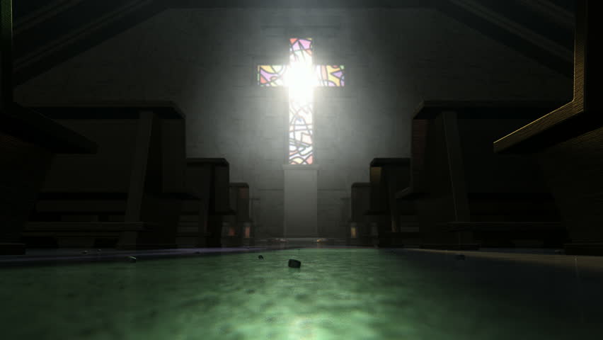 A pan down the aisle of an old church lit by suns rays penetrating through a stained glass window in the shape of a crucifix reflecting colors on the floor in amongst rows of church pews | Shutterstock HD Video #8074408